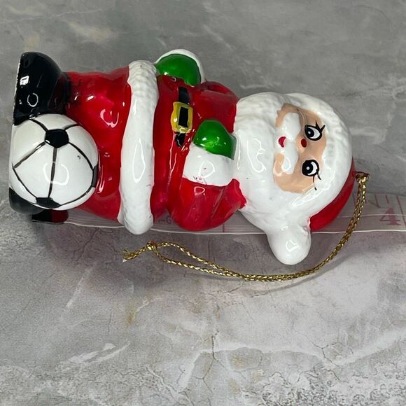 Vintage 1980’s hand painted Santa kicking a soccer ball. - Picture 4 of 9
